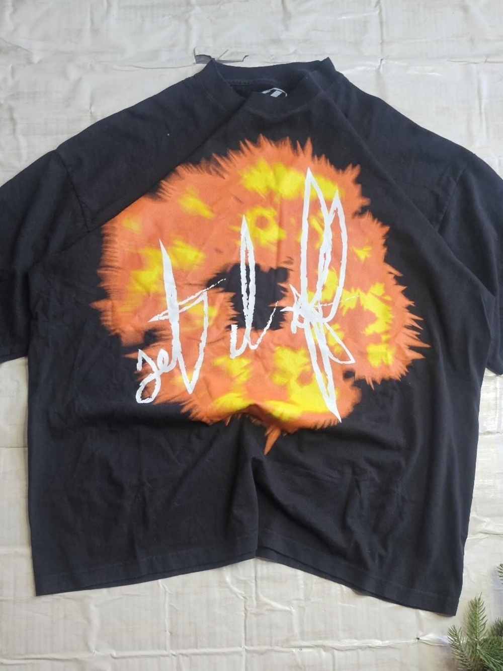 Black Short-Sleeve Tee with Orange & Yellow Burst Graphic